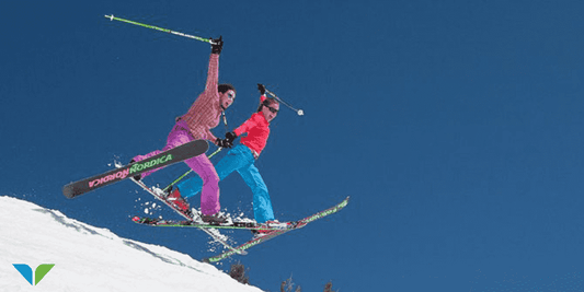 Two skiers enjoying spring skiing