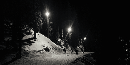 Cat track illuminated for night skiing